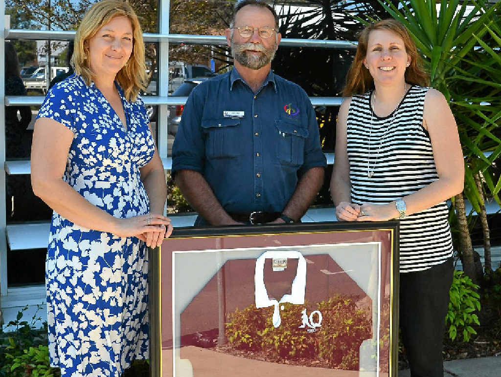 WIN WIN: Darling Downs South-West Queensland Medicare Local marketing engagement manager Melanie Cameron, jersey winner Glen Reid and Toowoomba Hospital Foundation events manager Tammy Wilson.